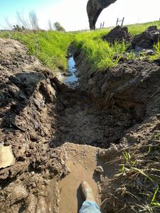 Our Ditch Work Culvert Installation service ensures effective water management by expertly installing secure, durable culverts. Enhance your property's landscape and prevent flooding with our reliable, professional solutions tailored to your needs. for SilverStone Excavation in Rigby, ID
