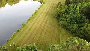 Our Pond Maintenance and Management service offers homeowners professional assistance in ensuring their ponds are clean, healthy, and well-maintained for an optimal outdoor experience. for Fayette Property Solutions in Fayetteville, GA