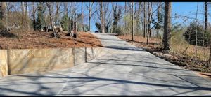 Our Concrete service offers homeowners a variety of options for their concrete needs. From patios and sidewalks to driveways and foundations, we can help you choose the right design and materials for your project. Plus, our experienced crew will take care of the installation quickly and efficiently. for D&D Unlimited Landscaping in Hartwell, GA