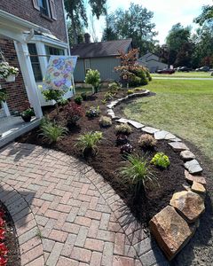 Our Lawn Care service ensures a lush, healthy lawn through precise mowing, fertilization, and tailored treatments. We enhance curb appeal while promoting robust grass growth for a vibrant outdoor space year-round. for Bielinski Bros Landscaping in Erie County, NY