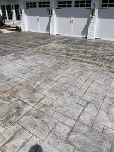 Our Driveways service offers homeowners professional concrete installation and design solutions for creating durable and visually appealing driveways that enhance the curb appeal of their property. for Musick Concrete Services in Kitty Hawk, NC