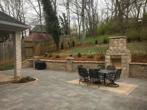 Our Retaining Wall Construction service offers skilled and reliable assistance in building sturdy, aesthetically pleasing retaining walls to enhance the functionality and beauty of your outdoor space. for Lamb's Lawn Service & Landscaping in Floyds Knobs, IN