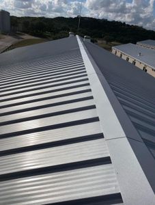 Our standing sean metal roofs service offers homeowners a durable and long-lasting roofing option that enhances the aesthetic appeal of their homes while providing excellent protection against harsh weather conditions. for Safe Roofing Inc in Jacksonville, NC