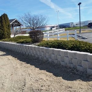 Our Retaining Wall Construction service offers durable, aesthetically pleasing solutions that prevent soil erosion and enhance landscape stability, tailored to complement your home's existing outdoor design for enduring beauty and functionality. for Mike's Grading Plus in Caldwell, ID