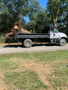 Our Debris Removal service efficiently cleans your property by safely removing clutter and waste from construction or landscaping projects, ensuring a tidy and hazard-free environment for you and your family. for Strong Contracting in Lebanon, KY