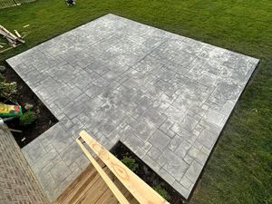 Our Stamped Concrete service provides homeowners with the ability to customize their concrete surfaces with various patterns and textures, enhancing the aesthetic appeal of their outdoor spaces. for Musick Concrete Services in Kitty Hawk, NC