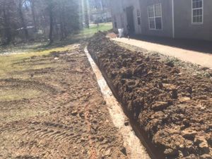 Our Trenching service can help you quickly and efficiently install pipes, wires, and other utilities beneath the surface of your property. for Elias Grading and Hauling in Black Mountain, NC