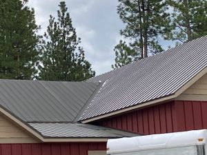 Our Metal Roofing service provides durable and long-lasting roofing solutions, ensuring superior protection for your home against various weather conditions with a sleek and modern appearance. for Wahl's Roofing and Construction in Clinton, MT