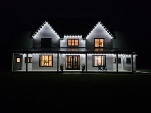 Enhance your home's ambiance with our expert outdoor lighting services, perfectly complementing your outdoor furniture. Create a stunning, illuminated space for relaxation and entertainment in any season with tailored lighting solutions. for Risner Construction in De Motte, IN