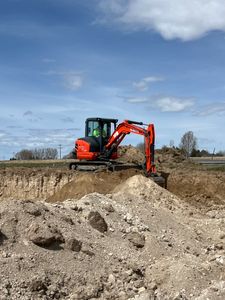 Discover the excavation meaning with our expert services, transforming your landscape by safely and efficiently removing soil for foundations, pool installations, in ground trampolines, and pond construction to enhance your outdoor living space for Falls Property Services  in Idaho Falls, ID