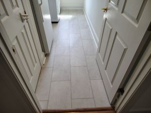 Transform your home with our premium tile flooring service, offering a versatile and durable alternative to wood flooring. experience long-lasting elegance and easy maintenance tailored to enhance any living space. for Brooks Flooring in Burlington, NC