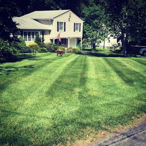 Our Lawn Aeration service helps homeowners by improving soil health and promoting better root growth, resulting in a greener and healthier lawn. for Quiet Acres Landscaping in Dutchess County, NY