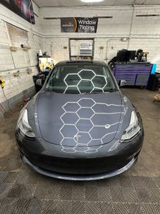 Enhance your Tesla's aesthetics and privacy with our professional window tint service, providing optimal heat reduction and protecting against harmful UV rays. for Midwest Precision Films in Goshen, IN