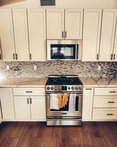 Our Kitchen Backsplash service offers homeowners a stylish and functional solution for protecting their kitchen walls while adding a decorative element to enhance the overall aesthetic of their space. for Flawless Tile Company in Boise, ID