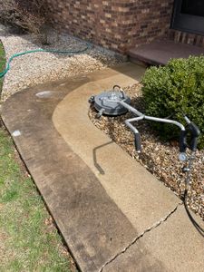 We provide professional concrete cleaning services to restore your home's exterior surfaces and make them look brand new again. for Blue Line Pressure Washing in Carthage, IL