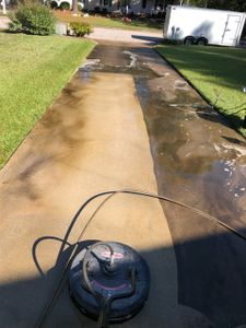 The Driveway & Sidewalk Cleaning service is a professional and thorough service that will clean your driveway and sidewalks. Our experts will use the latest equipment and techniques to get your driveway and sidewalks clean and looking great. for Paul's Lawn Care and Pressure Washing in Wilson, NC