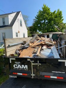 Our Dump Services provide convenient and efficient waste removal solutions for homeowners, ensuring hassle-free disposal of unwanted materials at your doorstep. for Cuellar Lawn Care in Highland , NY 