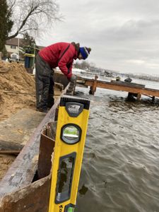 We can design and build sea walls as well as permanent docks. Reach out to get a free quote. for Wagner's Lift and Dock Shop LLC in Watervliet, MI