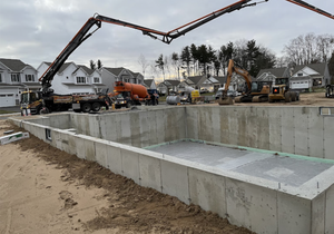 Concrete construction is a process that uses concrete to create floors, walls, and other structures. We offer a variety of concrete services from foundations to more. Reach out today to learn more about our concrete services. for Upstate Construction & Associates LLC in Albany, NY