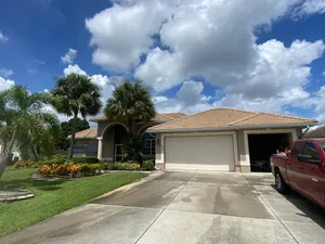 Our Concrete Cleaning service effectively removes dirt, stains, and grime from your driveways, sidewalks, and other concrete surfaces to enhance the curb appeal of your home. for Hubbard's Pressure Washing in Naples, FL