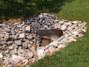 Drainage and erosion control in Aiken & the CSRA. We install French drains, dry creek beds, downspout solutions, grading, and more to fix water issues. for JFS Outdoor Services in Aiken, SC
