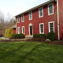 Our Mulch Installation service efficiently and effectively enhances the look of your landscaping while also protecting your plants from weeds, maintaining soil moisture, preventing erosion and adding nutrients to the soil. for RI Outdoor Living  in Charlestown, Rhode Island