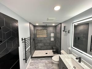 Our Bathroom Renovation service is designed to transform your outdated and inefficient bathroom into a modern and functional space, enhancing the overall value and comfort of your home. for Down Home Contracting in New Castle, PA