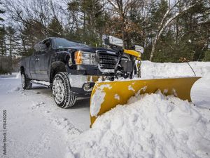 Our Commercial Snow Removal service ensures that your property remains safe and accessible during winter by clearing snow and ice from driveways, walkways, and parking areas. for Top Cut Lawn Service in Center Point, IA