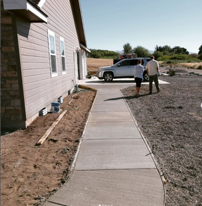 Our Sidewalk Installation service offers homeowners a seamless and durable solution to enhance their property's curb appeal, ensuring safe and stylish paths for pedestrians. for Richardson Restoration and Concrete in Ellensburg, WA