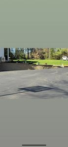 Our Patching service efficiently repairs cracks and potholes, restoring your asphalt's smooth appearance while enhancing safety and longevity—perfect for maintaining the quality of your driveway or parking area. for Reynoso’s Asphalt Service in Leominster, MA