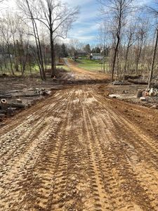 Our expert land grading service ensures a stable, level foundation for your home project, promoting effective drainage and preventing erosion while enhancing the property's overall landscape appeal and structural integrity. for A&S Excavating in Hanson, KY