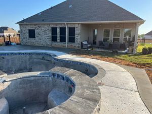 Our Patio Design & Installation service offers homeowners a tailored and professional solution for creating beautiful outdoor spaces through expertly designed and installed concrete patios. for Guzman's and Sons Concrete LLC in Cleburne, TX