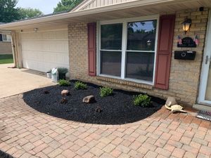 Our Mulch Installation service is a great way to improve the appearance of your lawn. We can install mulch in any shape or color you desire, and we'll work with you to find the best solution for your property. for High Garden Landscapes in Middletown, Ohio
