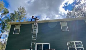 Cleaning debris out of gutter systems is crucial to prevent overflowing gutters and water landing at your home's foundation. We also inspect downspouts and unclog if necessary to ensure proper draining. for Prime Time Pressure Washing & Roof Cleaning in Moyock, NC