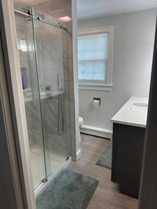 Transform your bathroom into a modern oasis with our expert renovation services. We focus on quality, style, and functionality to create a space tailored to your needs and preferences. for Top Pros Construction in Haverhill, MA