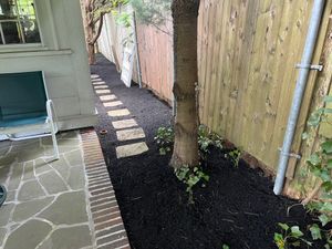 Enhance your garden's beauty with our professional mulch installation service, providing moisture retention, weed control, and improved soil health while adding a polished look to your landscape. for Jose & Sons Landscaping in New Bedford, MA