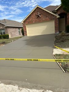 Our Driveways service offers homeowners a reliable and professional solution for installing or repairing concrete driveways, enhancing the aesthetics and functionality of your property. for JM Concrete in Dallas, TX