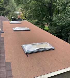 Enhance your home's natural lighting and energy efficiency with our Skylight Additions service. Our expert team ensures seamless installation, boosting property value and creating a brighter, more inviting living space. for RJ Roofing in Brevard, NC
