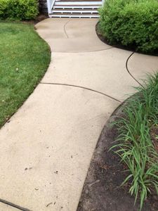 Hardscape Cleaning is a process that uses pressure washing and soft washing to clean outdoor surfaces such as walkways, patios, driveways, and pool decks. for Kenny's Lawn Care & Pressure Washing in Henderson, NC