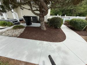 Enhance your garden's appeal and health with our expert mulch installation service, offering superior moisture retention, weed control, and aesthetic appeal to beautifully transform your outdoor space effortlessly. for Bew’s Lawn Care in Girdletree, MD