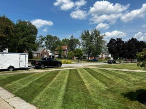 Our Lawn Maintenance service ensures a lush, healthy yard through regular mowing, edging, and fertilization, enhancing your outdoor space's aesthetic appeal while preserving the health and vitality of your grass. for Leaps Landscaping LLC in Buffalo, NY