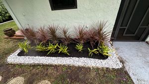 Our mulching service includes expert mulch installation to enhance your landscape by improving soil quality, retaining moisture, suppressing weeds and giving a visually appealing finishing touch to your garden beds. for South Florida Terra Systems in Boca Raton, FL