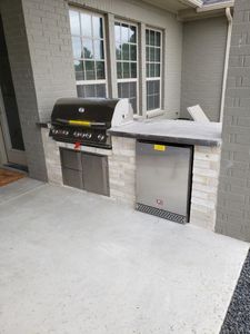 Our Outdoor Kitchen Installations service offers homeowners the opportunity to enhance their outdoor spaces by creating functional and attractive kitchens made with durable concrete materials. for R&R Innovations Contracting  in Dallas, TX