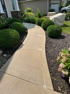 Our Driveway and Sidewalk Cleaning service is designed to efficiently remove dirt, grime, and stains from your exterior surfaces, enhancing the overall appearance of your property. for Klean it Kens Pressure Washing in New Haven, IN