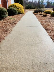 Our concrete washing service is a great way to clean and restore your driveway, patio, or any other concrete surface. We use high-pressure water to remove dirt, oil, and stains, leaving your concrete looking like new. for Bullards Pressure Washing Services in Pembroke, NC