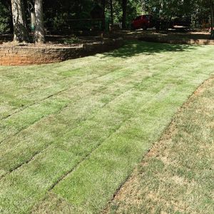 Our Sod Installation service includes professional delivery and installation of fresh, premium sod to transform your lawn quickly and efficiently. Enhance curb appeal with our expert mulch delivery and installation. for Sanders Landscape & Maintenance in McDonough, GA