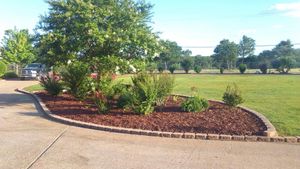 Enhance your garden's health and appearance with our expert mulch installation service. Our professional team ensures proper application, promoting soil moisture retention and weed control for vibrant, flourishing landscapes. for Superior Lawn and Tree LLC in Clifton, TX
