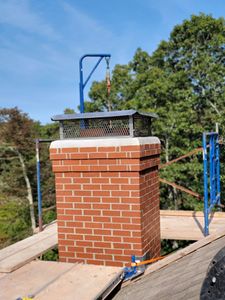 Our Chimney Rebuild service ensures safety and longevity through expert chimney repairs, restoring structural integrity and enhancing your home's aesthetic appeal with meticulous craftsmanship tailored to withstand harsh weather conditions. for GPG Masonry in Sandwich, MA