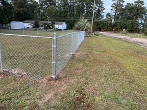 Our Chain Link service offers durable and versatile fencing options, allowing homeowners to enhance security and privacy while maintaining an attractive appearance for their properties. for 4 In The Fire Fencing LLC in Darlington, SC