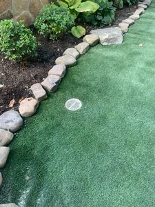 Transform your backyard into a low-maintenance oasis with our artificial turf service. Say goodbye to watering, mowing and weeding and hello to year-round greenery. for Hydrologic Designs LLC in Rogers, AR